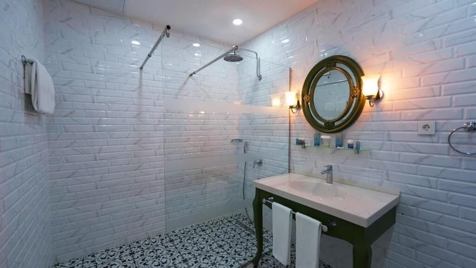 Shower, free toiletries, hair dryer, bathrobes