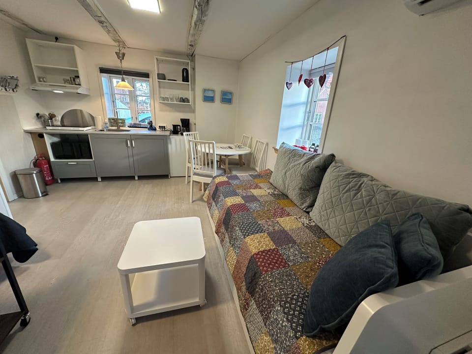 Family Studio, Patio, Courtyard View | Iron/ironing board, free WiFi