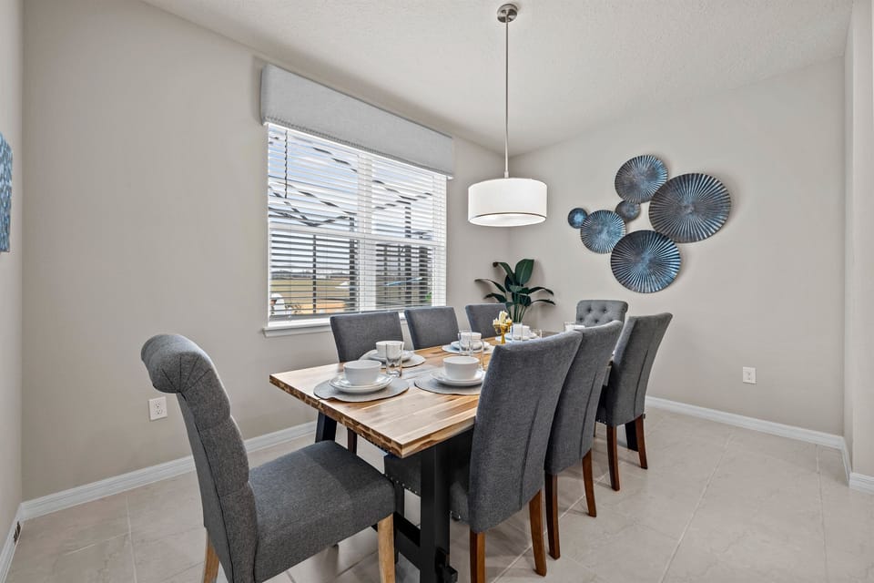 ✨ Spacious dining area with seating for 6—perfect for family meals, takeout nights, and planning your Disney adventures.