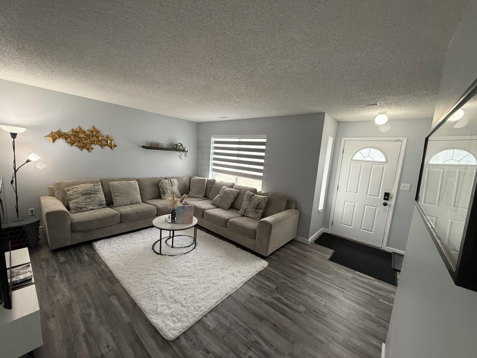 Front entrance attached to the bright living room
