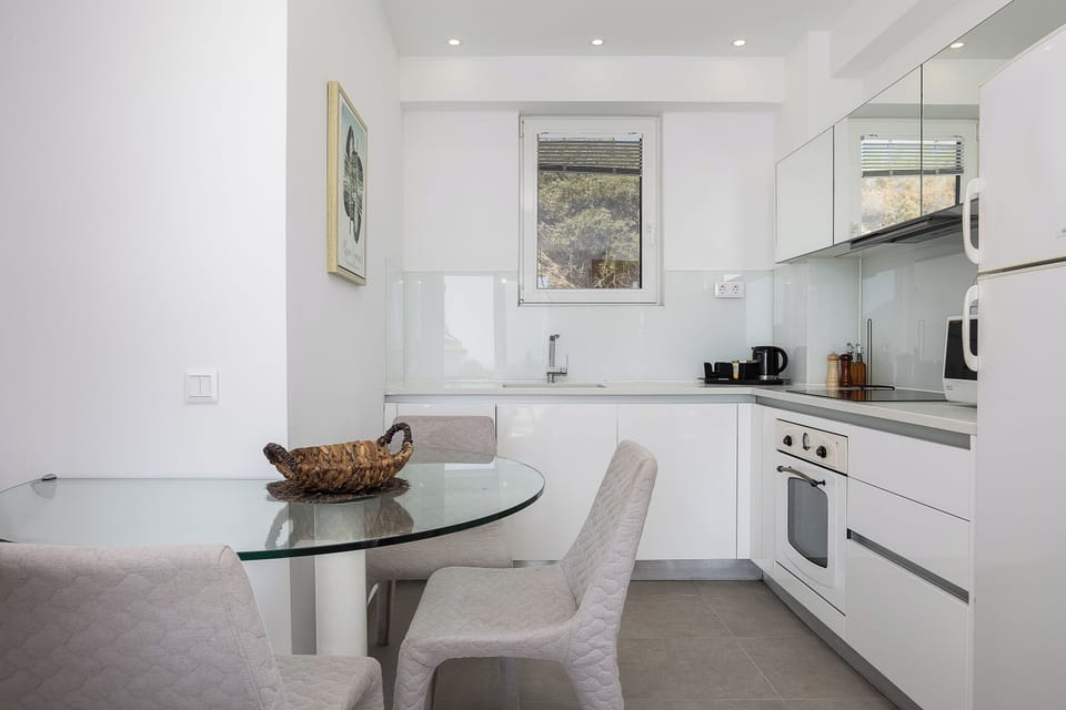 Minimalist kitchen designed for both style and function.