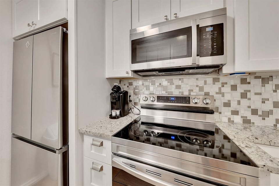 Compact cooking area w/ coffee maker & stainless appliances