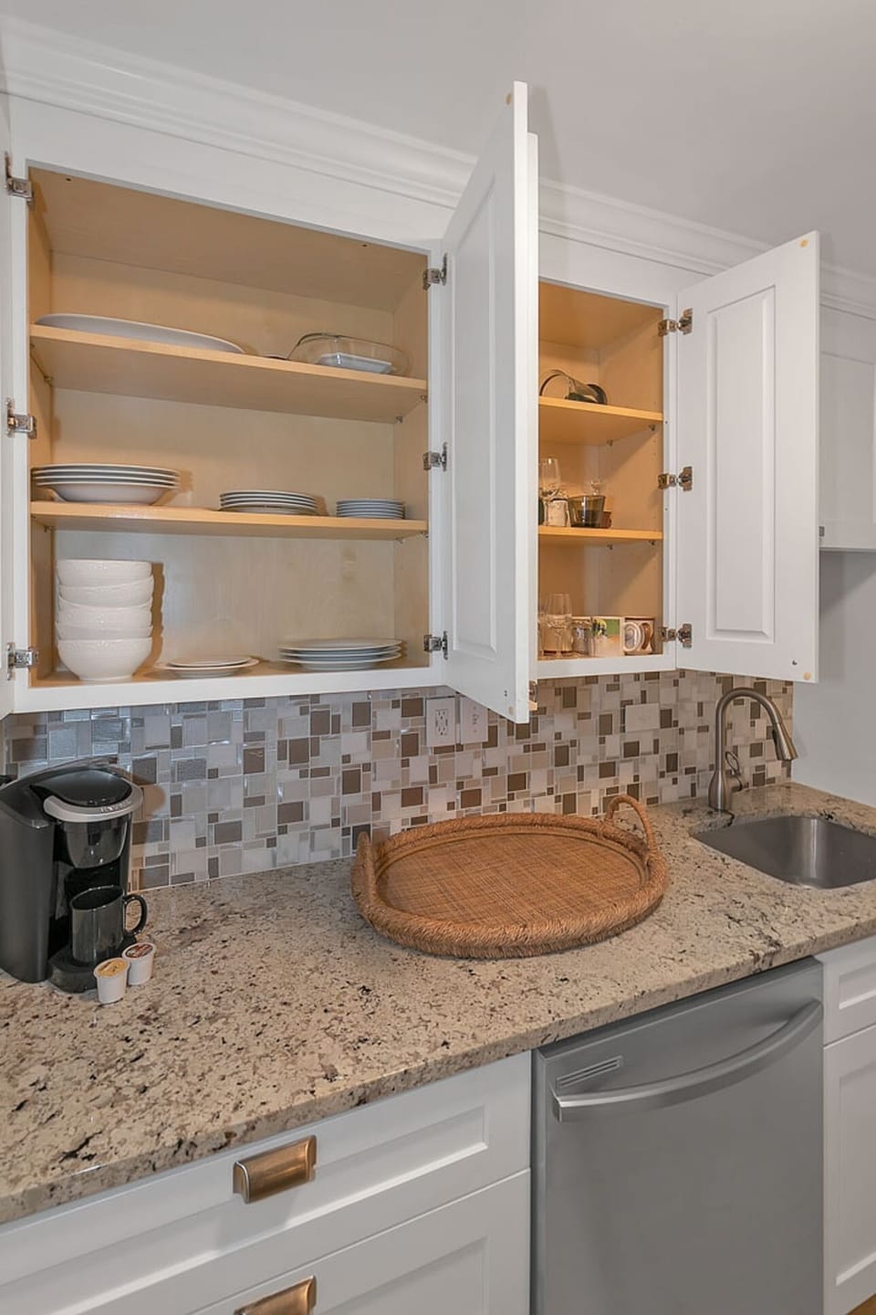 Stocked cabinets & coffee maker for easy mornings at home