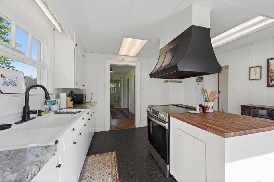Bright kitchen with modern appliances and clean finishes.