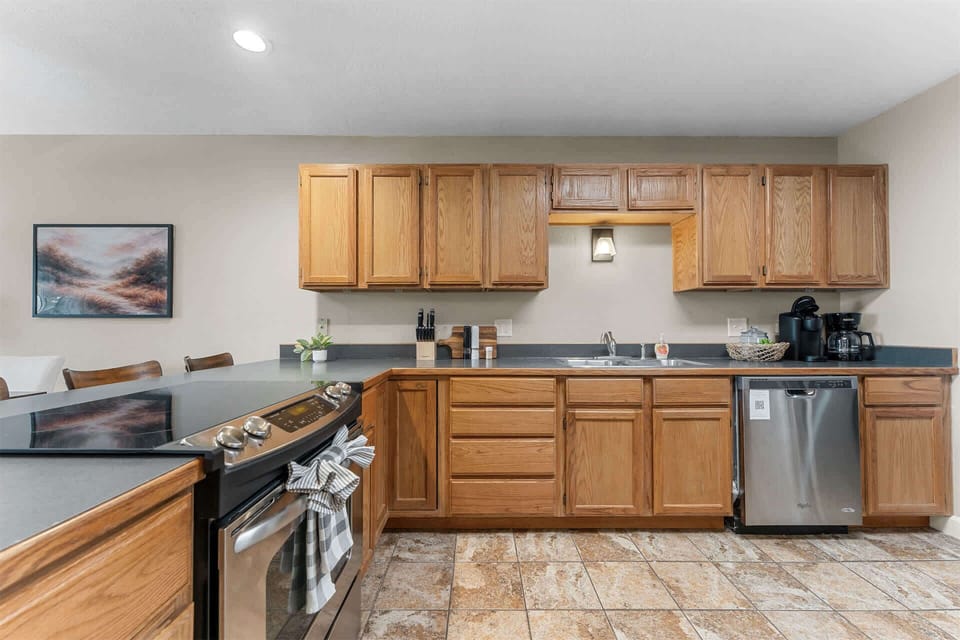 The open kitchen is well equipped for an unforgettable getaway​