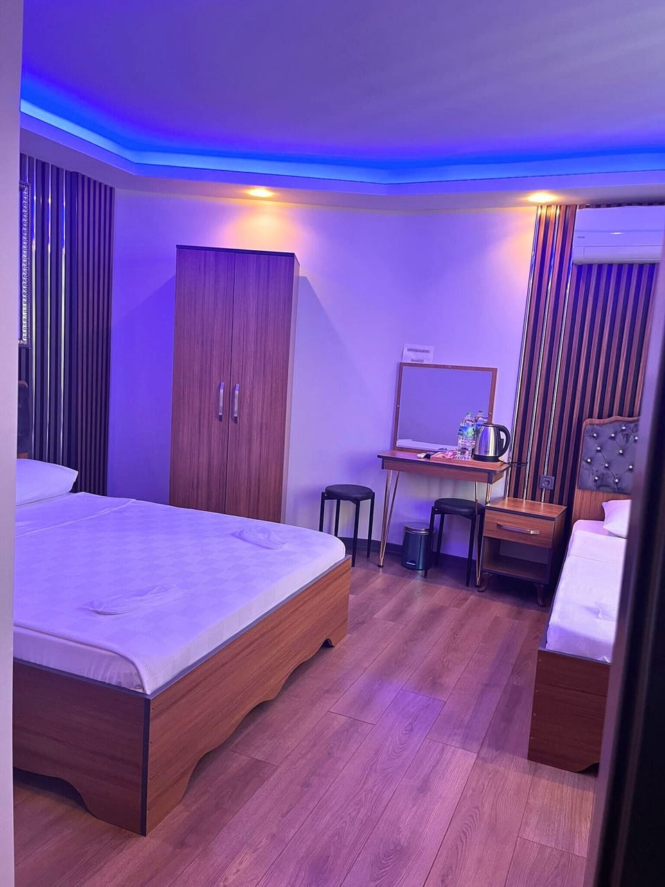 Family Triple Room | Living area | TV