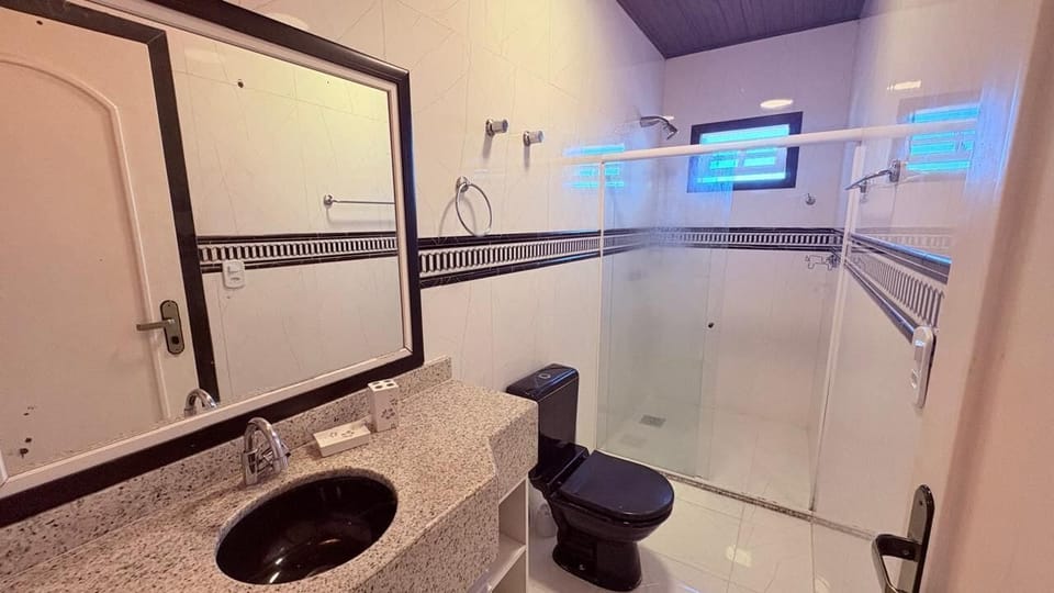 Comfort Room | Bathroom | Shower, towels, soap, shampoo