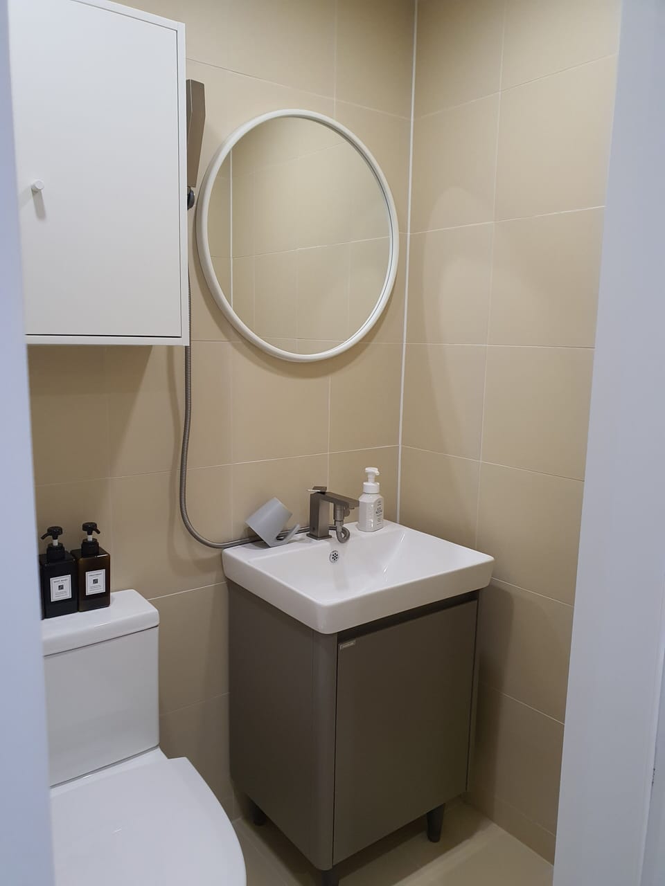 Shower, hair dryer, slippers, towels