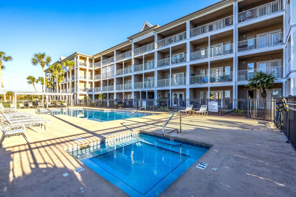 Sea Sparrow Condo - Grand Caribbean West 113 by PKRM - Walk right out to the pool from the Sea Sparrow!
