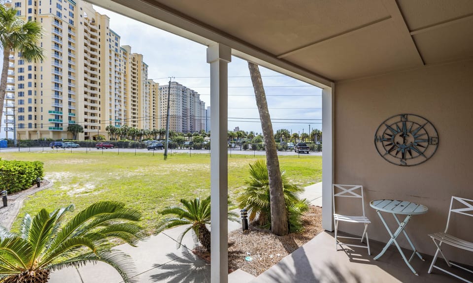 Sea Sparrow Condo - Grand Caribbean West 113 by PKRM - Come sit on the patio.