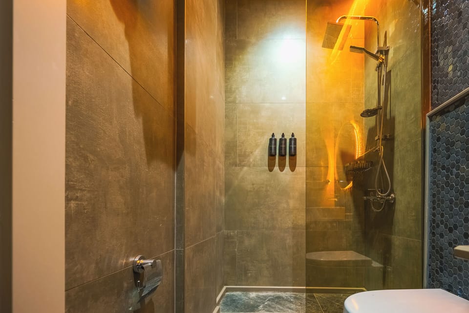 Shower, slippers, towels, soap