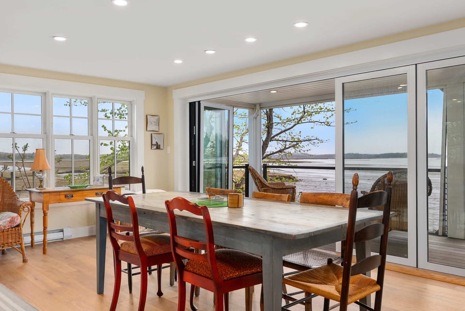The dining table with ample seating with a view.