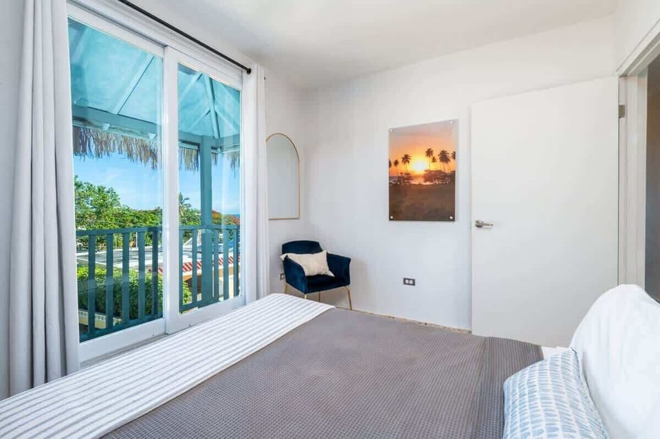 Tropical retreat in Rincón, Puerto Rico — sunset views, balcony breeze, and serene design for unforgettable island stays.