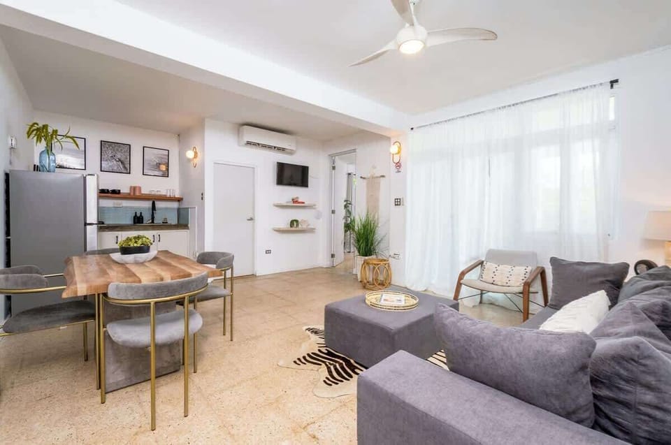 Open-concept comfort in Rincón, Puerto Rico — stylish seating, natural light, and modern amenities for relaxed island living.