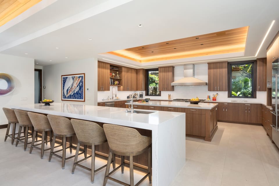 Gather around the expansive kitchen island where culinary dreams come alive in your stylish retreat.