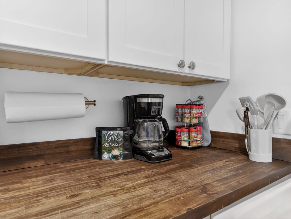 Bright, functional kitchen—perfect for morning coffee or a cozy night in