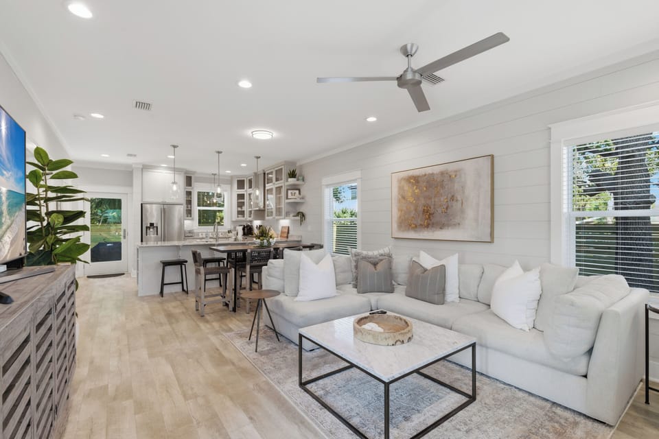 Unwind in this bright, open living space where modern comfort meets coastal elegance. Your perfect retreat features a plush sectional sofa.