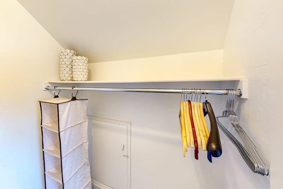 Hang your vineyard-hopping outfits in this tidy closet with a full rod, shelf storage, and organizer — everything in its place for your Sonoma stay.