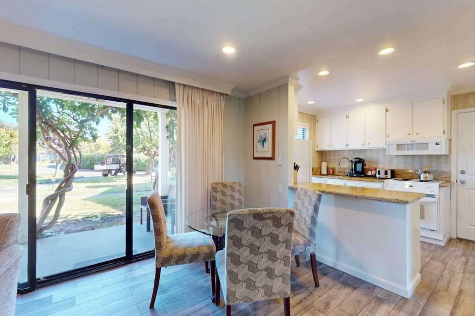Share a farm-to-table meal at your glass dining table with garden views streaming through the sliding doors of your Silverado Resort condo.