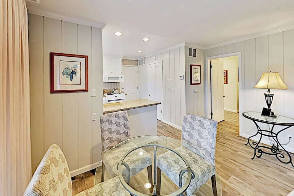 Enjoy a casual breakfast at your intimate dining nook with local artwork and a convenient kitchen pass-through for easy Napa Valley entertaining.