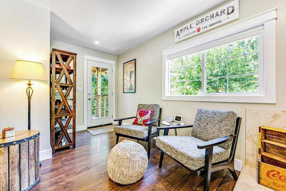 Sip your morning coffee in this charming reading nook — browse the wine rack and plan your Sonoma County tasting itinerary