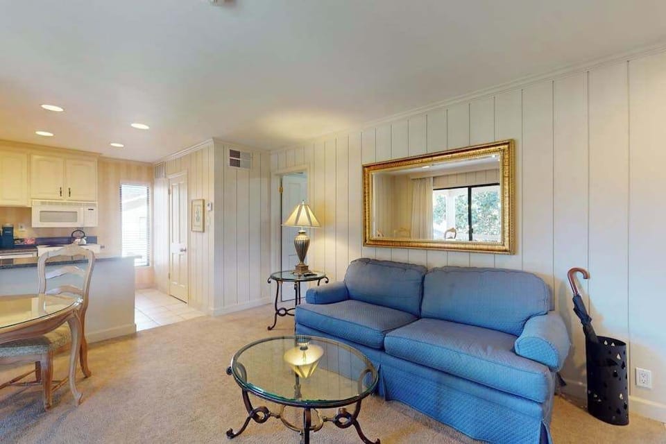 Relax in the sunlit living room with easy access to your fully equipped kitchen — ideal for planning your Napa Valley itinerary