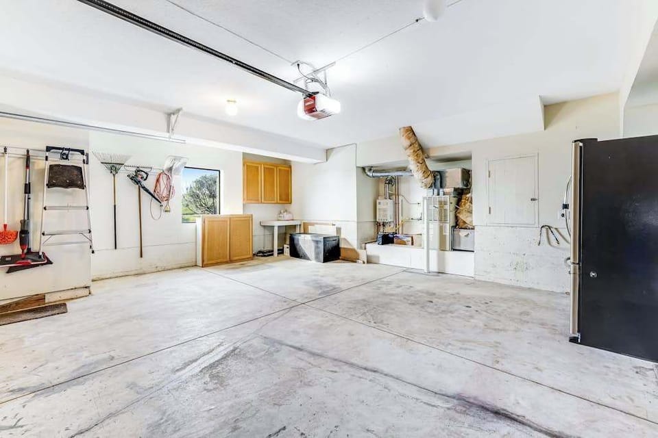 Your oversized two-car garage stores beach chairs, a second fridge for provisions, and plenty of room for gear from your coastal adventures