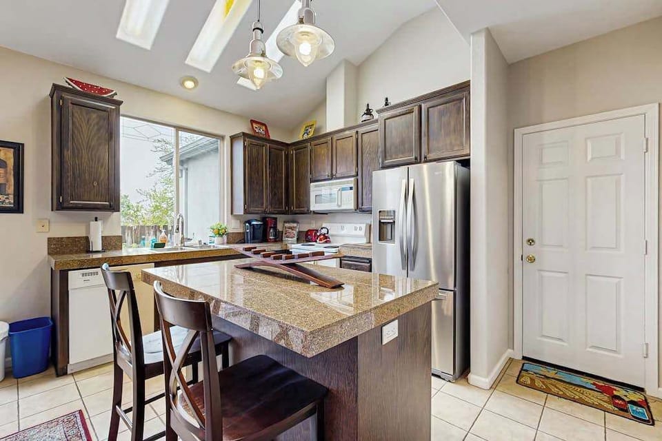 Brew your morning cup in a fully equipped kitchen with granite countertops, a breakfast bar, and stainless steel appliances — everything you need to cook with local Sonoma ingredients.