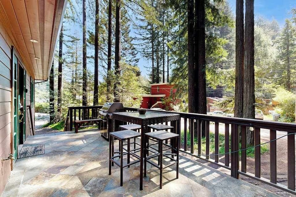 Gather around your high-top deck table for al fresco lunches with redwood canopy views — the BBQ grill stands ready for your Sonoma County farmers' market finds.