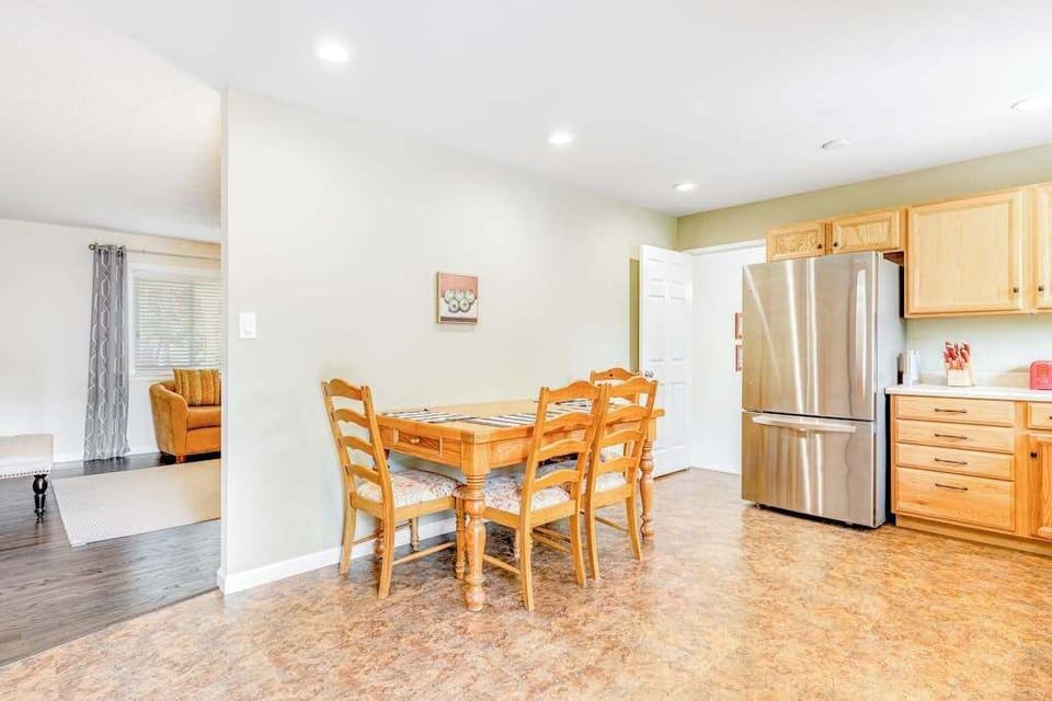 Share farm-to-table meals at your dining table for four — an open layout connects you to the fully equipped kitchen for effortless Kenwood entertaining.