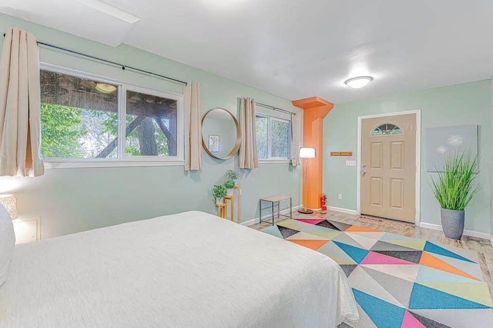 Step right outside from your lower bedroom through its own private entrance — perfect for early risers heading to the Forestville River Access trail.