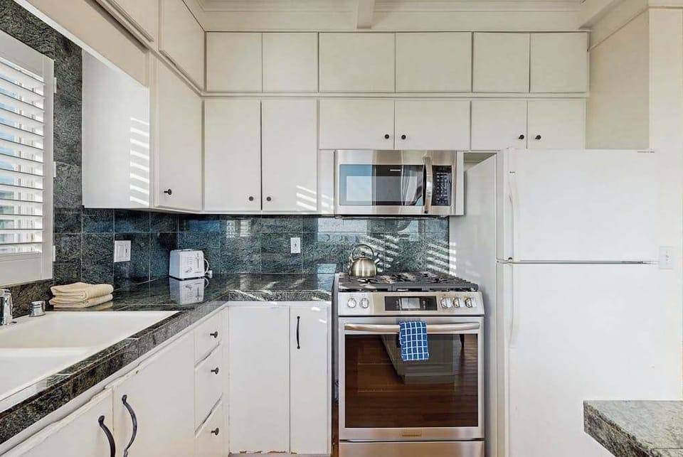 Whip up coastal feasts with a gas stove, microwave, and full-size refrigerator in your well-stocked kitchen