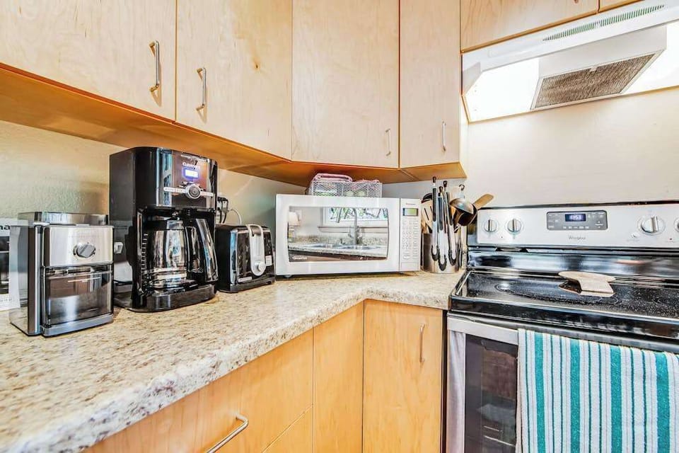 Mornings start right with your dedicated coffee station, toaster, blender, and microwave — everything you need to fuel up before exploring Sonoma's vineyards and redwood trails.
