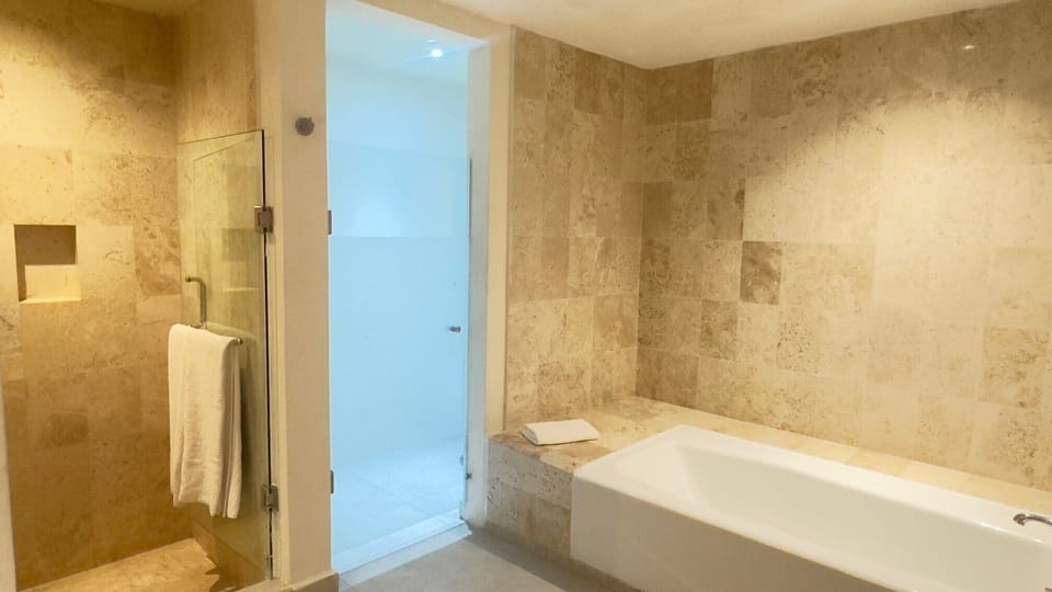 Room, 1 King Bed (The Big Room) | Bathroom | Shower, free toiletries, towels