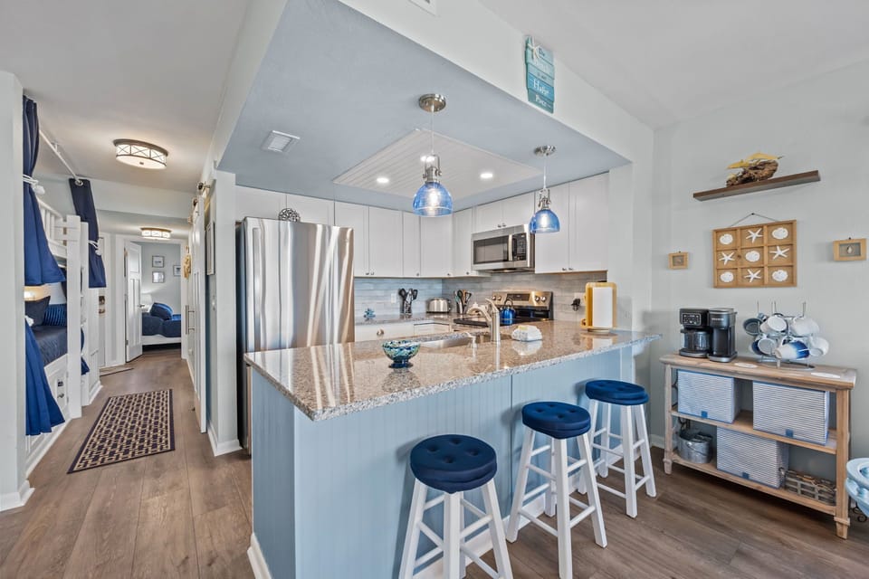Breakfast bar with seating for three, ideal for quick bites or casual hangouts