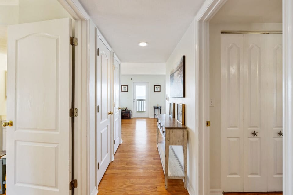 The hallway separates the two bedrooms