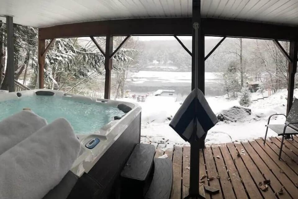 Outside the game room and our 
hot tub awaits, nestled in a winter wonderland.
