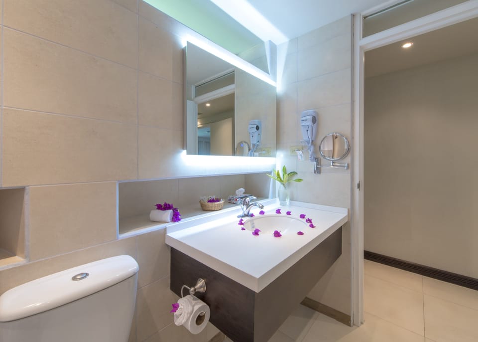 Shower, designer toiletries, towels
