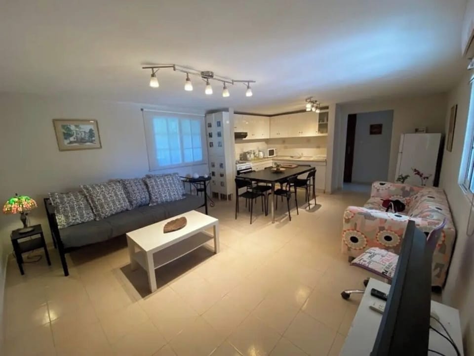 Apartment, 2 Bedrooms, Balcony, Garden View | Living room | Books