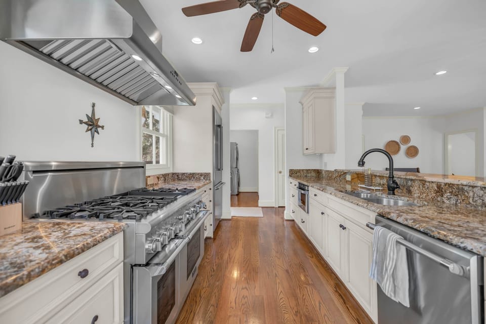 Updated kitchen, stocked well with cooking utensils and dishes