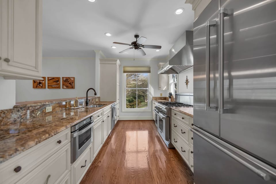 Updated kitchen, stocked well with cooking utensils and dishes