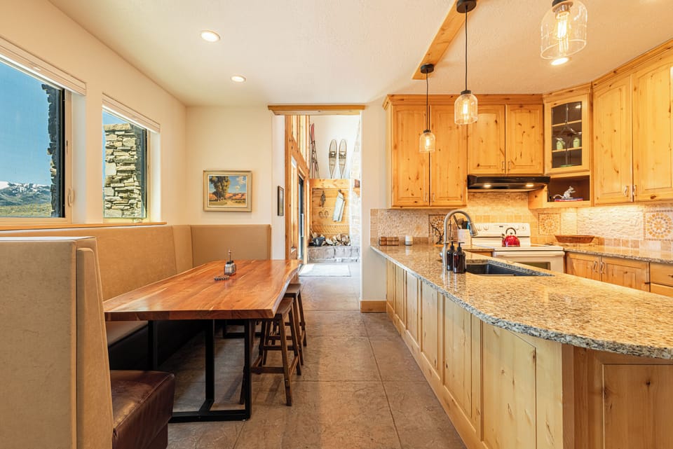 Kitchen table with bench and bar stool seating