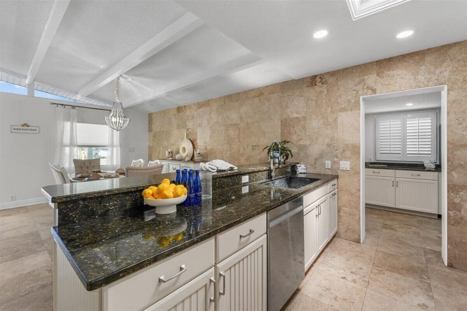 Fully Equipped Kitchen – Includes stove, oven, microwave, dishwasher, refrigerator, blender, coffee maker, and toaster