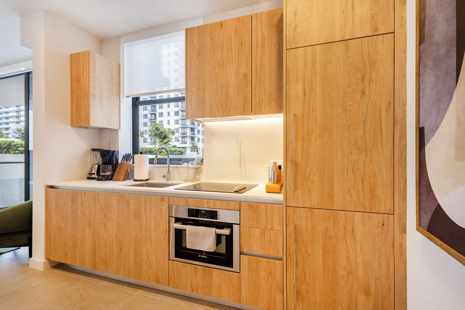 Full kitchen with convection oven, stovetop, blender and coffee maker