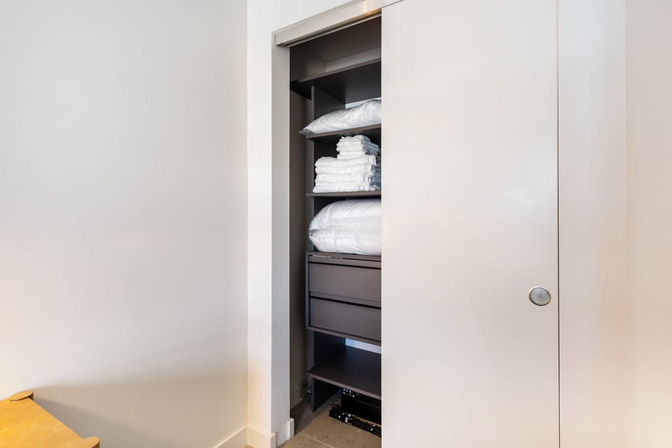 Ample closet space stocked with extra linens, pillows and bath towels. Iron, shirt and dress hangers also available.
