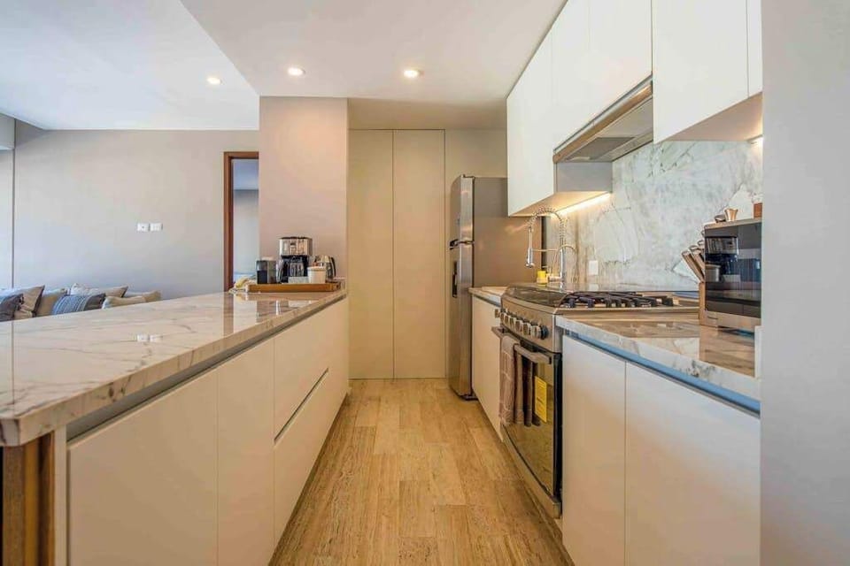 Fully equipped kitchen with oven and microwave