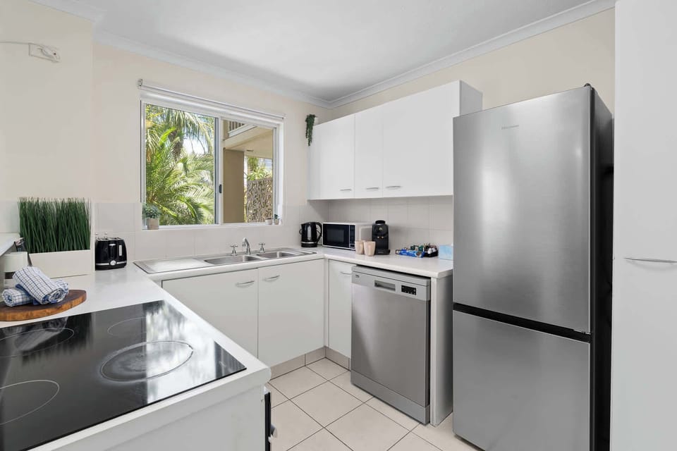 A fully equipped kitchen, modern appliances, cooking essentials, coffee maker - a home from home !