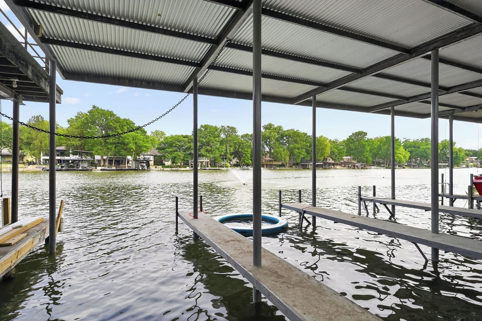 Boat slip with direct access to Lake McQueeney, perfect for boating.