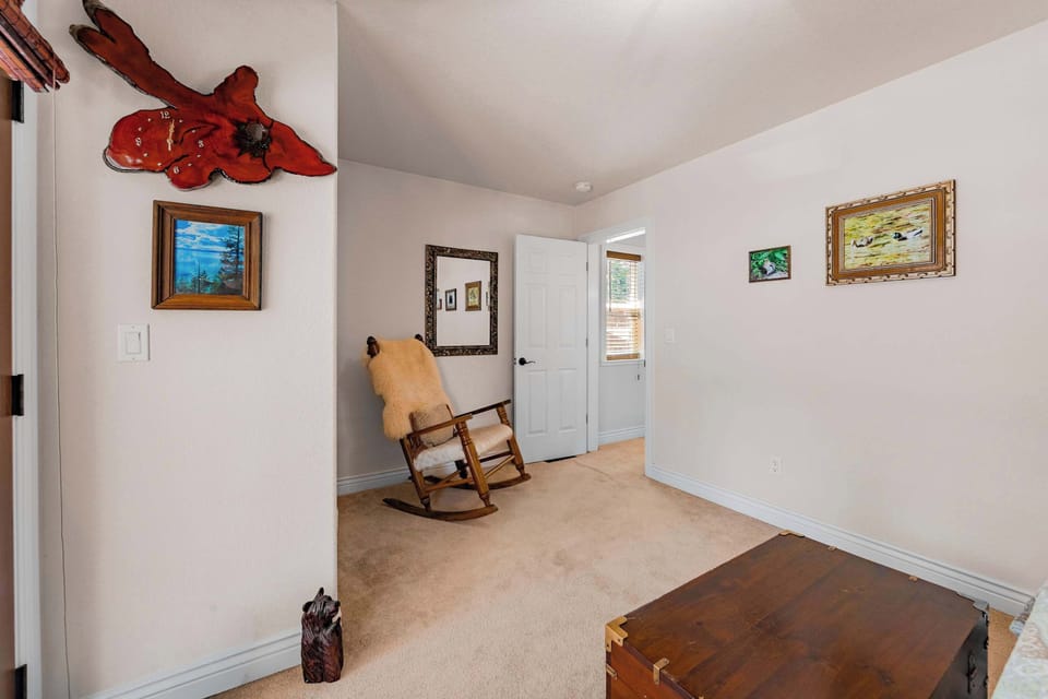 Bedroom 2 with queen bed and balcony 