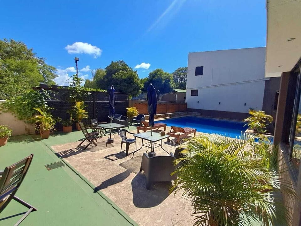 Basic Quadruple Room | Pool | Outdoor pool